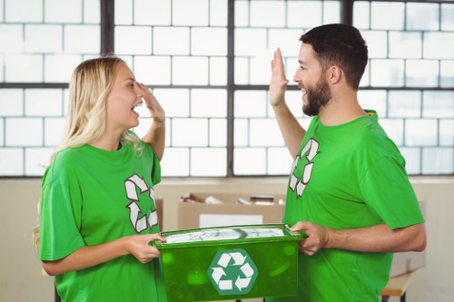Professional waste clearance team handling construction debris